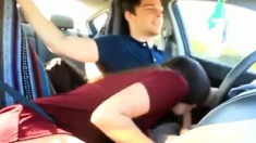 Lucky guy gets his dick sucked in the car by a hot babe