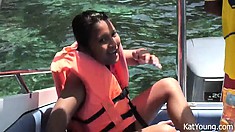 Latina teen newbie Kat Young takes a ride on the boat in her bikini